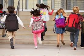 kids going school wearing school bags
