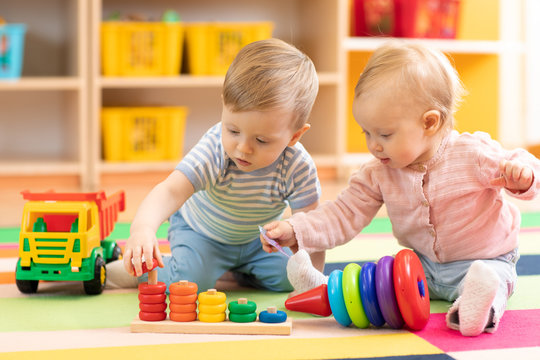18 month old babies playing with toys