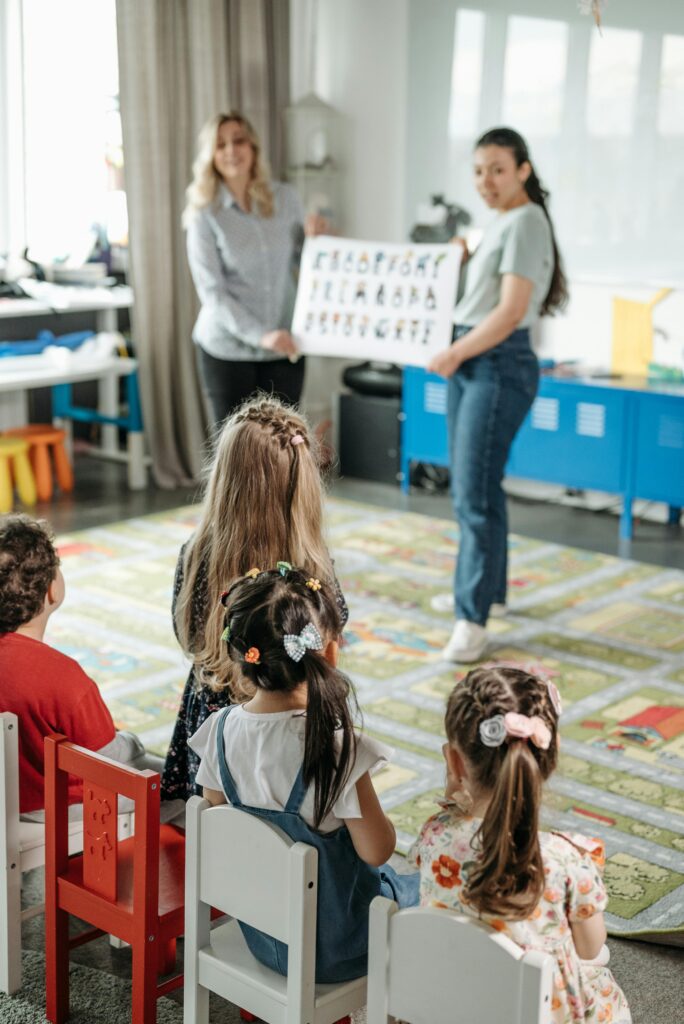 montessori-period-three-child-smiling-recalling-answer.jpg