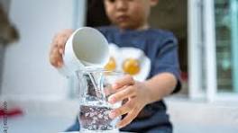 kid ispouring water