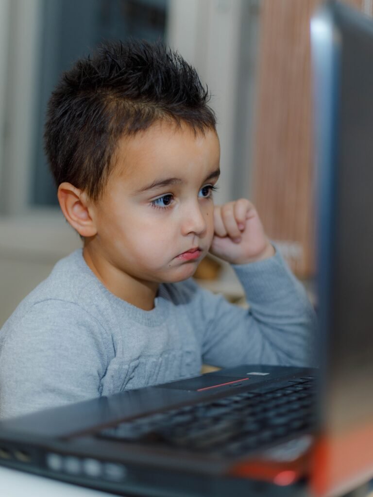 kid is watching screen silently