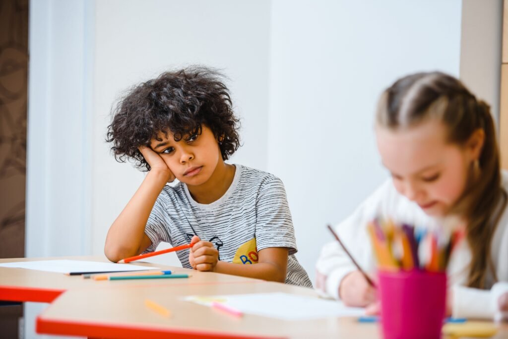 kid is trying to focus on studies